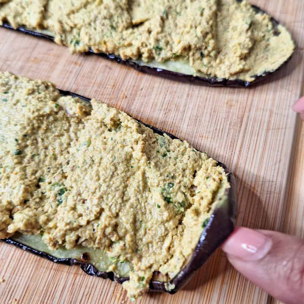 Being rolling the eggplants