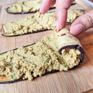 Making an eggplant roll with walnut paste