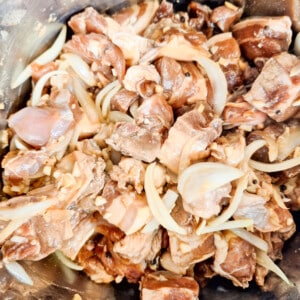 Browned meat inside a stockpot