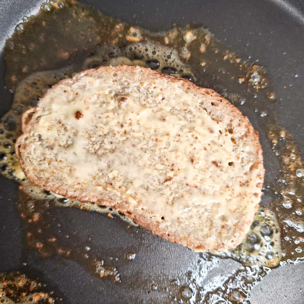 Buttered bread on a pan for Georgian egg bread or kikliko