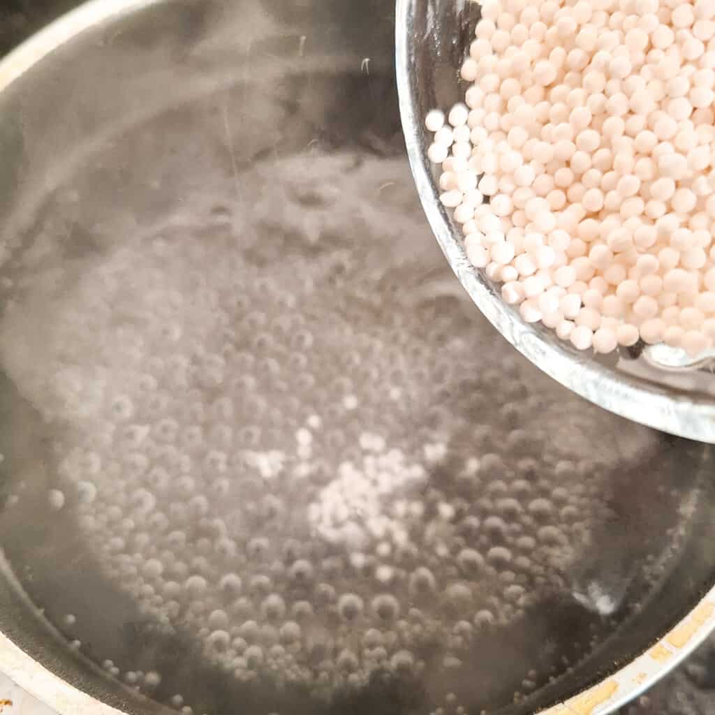 Pour dehydrated tapioca balls in boiling water