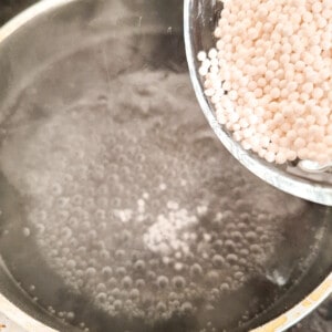 Pour dehydrated tapioca balls in boiling water