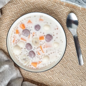 Filipino coconut dessert soup with sago or ginataang bilo bilo in white bowl