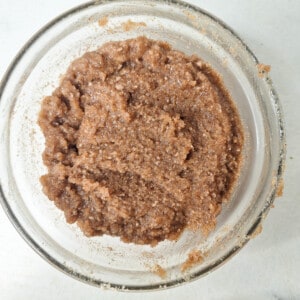 Mixed butter, sugar, and spices in a small glass bowl