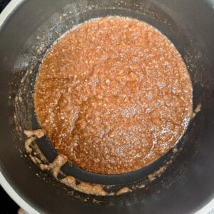 Spiced sugar melting in a small pot