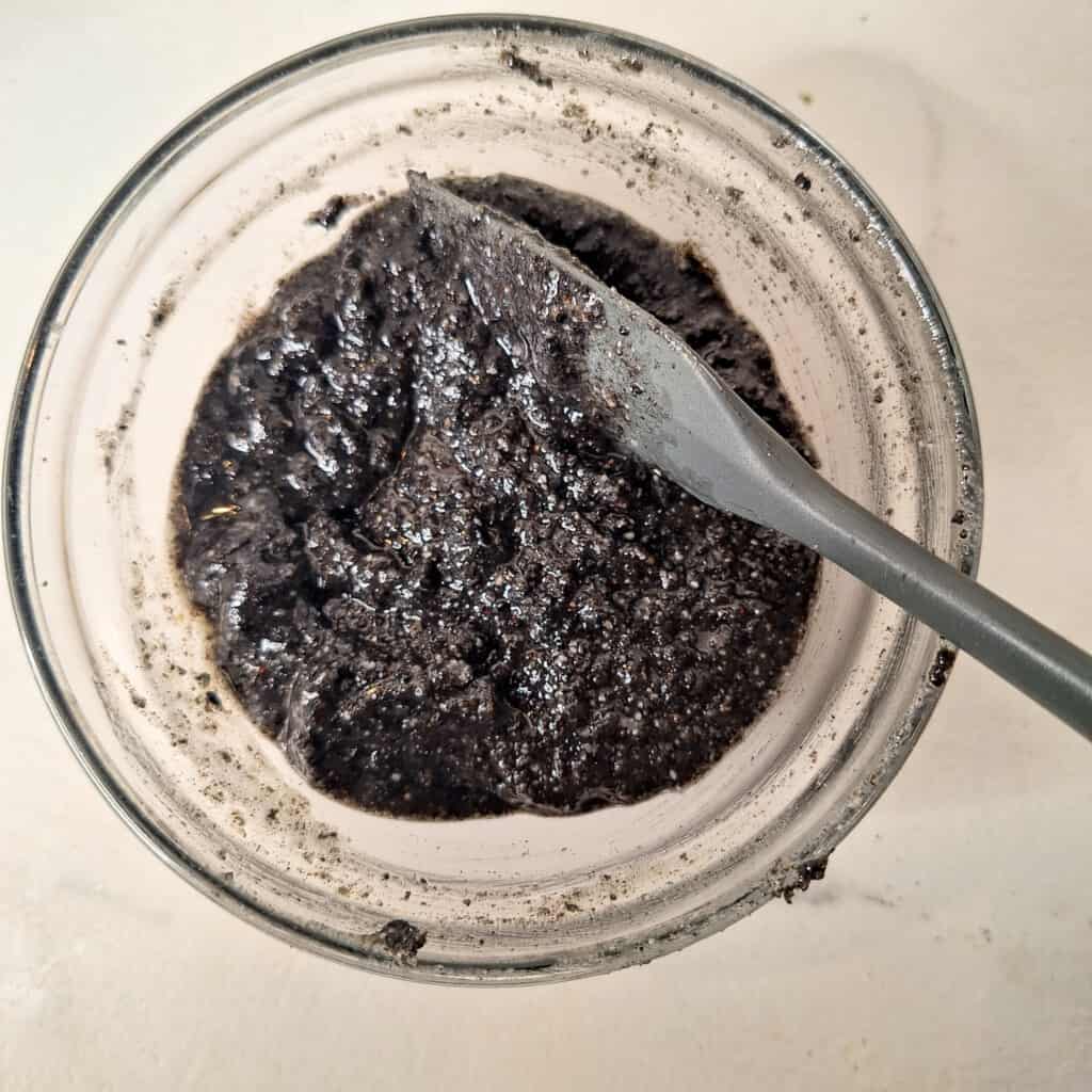Black sesame paste in a clear bowl