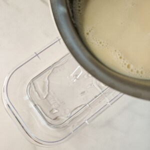 Pour the hot soy milk in the container with the GDL water mix