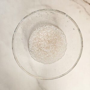 Partially cooked tapioca balls for taho in a glass bowl