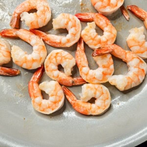 Shrimp being fried in a pan